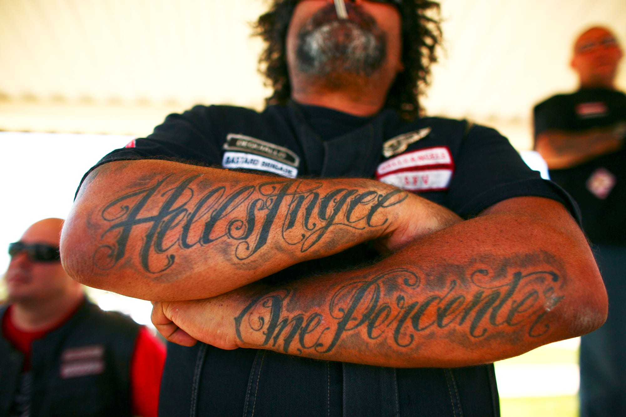 A dozen Hells Angels  have been charged with consorting with criminals
